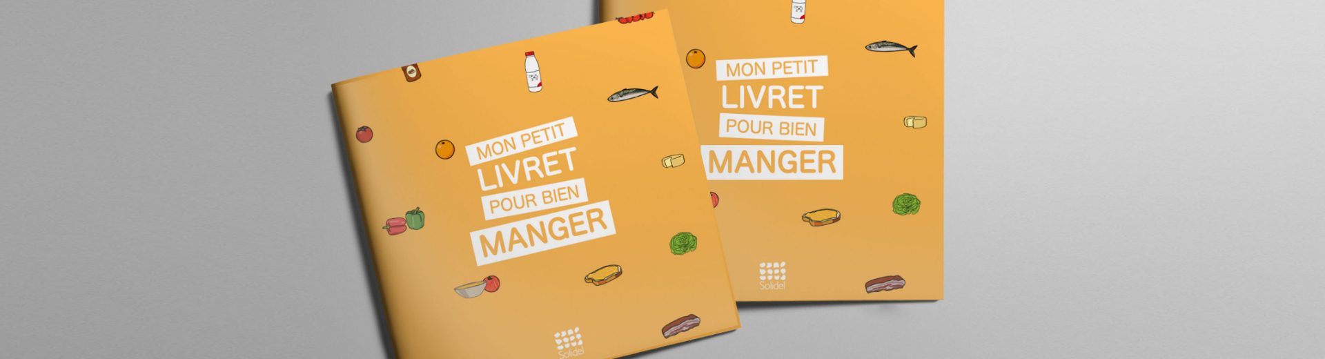 Deux livrets jaunes « Mon petit livret pour bien manger » avec petits dessins d’aliments sur fond gris