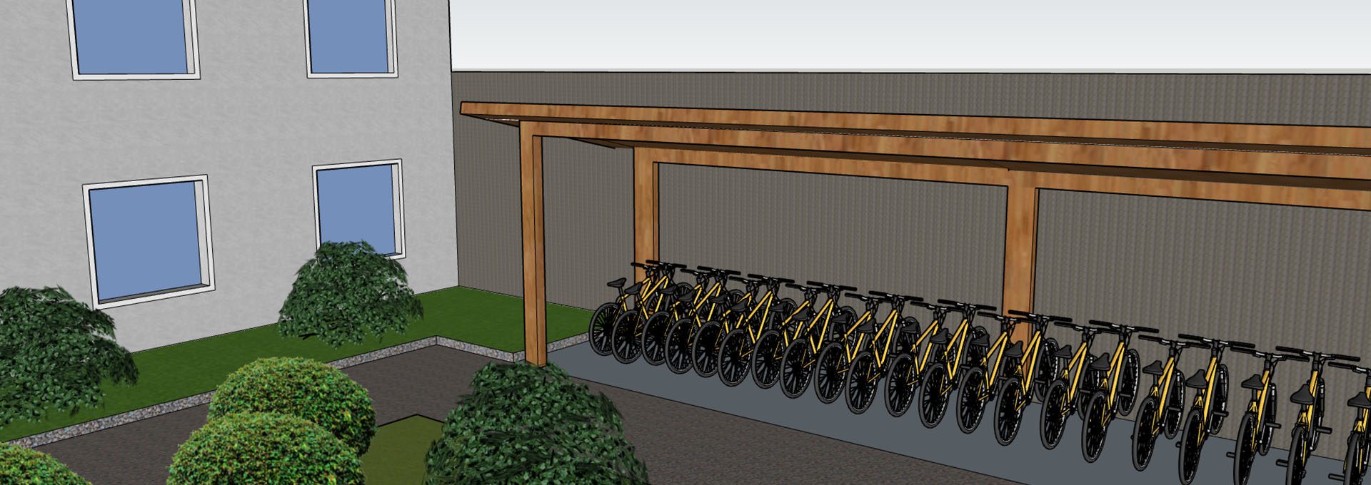 Abri à vélos en bois adossé à un bâtiment gris, avec rangée de vélos stationnés et arbustes au premier plan